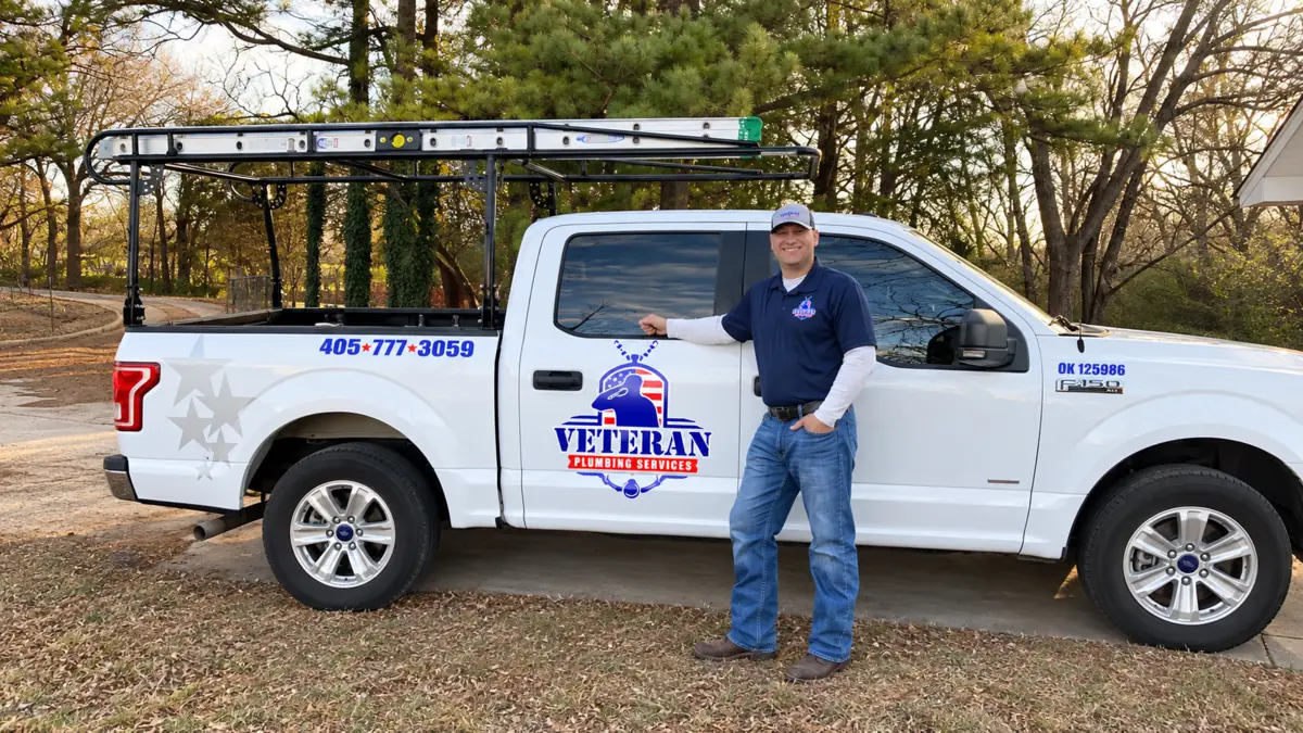 veteran-plumbing-david-truck-optimized Veteran Plumbing Services technician David with company truck in Norman, Oklahoma